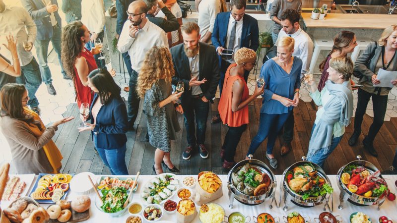 A,Vibrant,Gathering,Featuring,Diverse,Groups,Of,People,Enjoying,A
