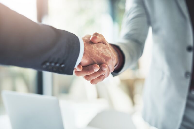 Trust,,Handshake,And,Business,People,In,Office,For,Deal,,Welcome