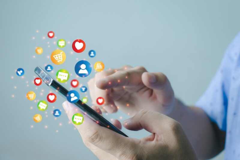 Social,Media,Technology,Concept,,Man,Hand,Using,Smartphone,Login,To