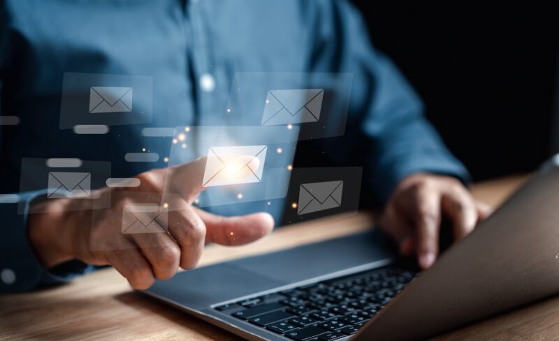 Businessman,Sending,Email,By,Laptop,Computer,To,Customer,,Business,Contact