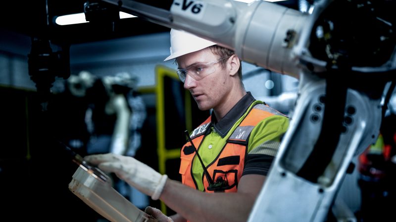 An,Engineer,Works,On,An,Ai,Robotic,Arm,,Representing,The